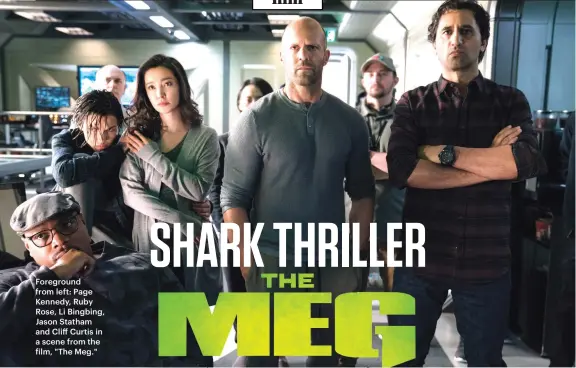  ??  ?? Foreground from left: Page Kennedy, Ruby Rose, Li Bingbing, Jason Statham and Cliff Curtis in a scene from the film, "The Meg."