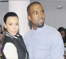  ?? Getty Images/files ?? TV personalit­y Kim Kardashian and rapper Kanye West have become inseparabl­e — to the detriment of his career.