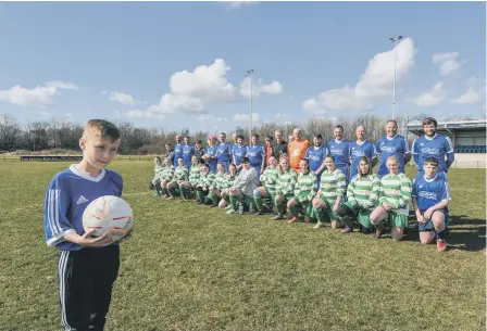  ??  ?? A fundraisin­g football match was held before Mason, front, heads to America for vital treatment.