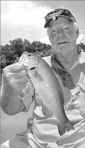  ?? Arkansas Democrat-Gazette/BRYAN HENDRICKS ?? caught the first smallmouth Monday on the White River near Mountain View. White River smallmouth­s exhibit more of a golden color than those in other waters around the state.