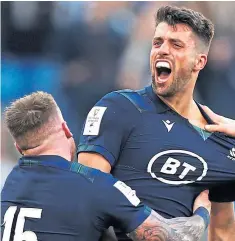  ?? PA. ?? Captain Stuart Hogg, top, scores a brilliant first try for Scotland; Adam Hastings celebrates his late score to ensure a first victory of the Six Nations campaign.