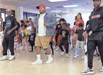  ?? RAY PADILLA / THE COMMERCIAL APPEAL ?? Memphis rapper Duke Deuce teaches a jookin’ dance class for kids at L.Y.E. Academy on Oct. 24.