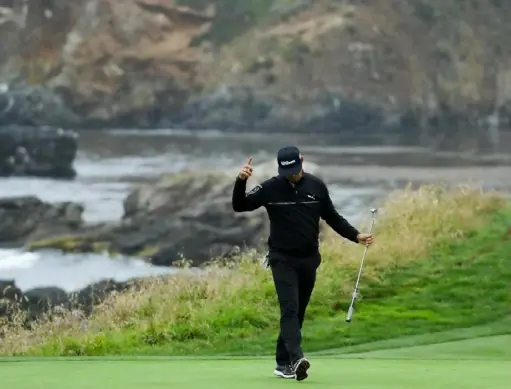  ?? Warren Little/Getty Images ?? Gary Woodland of the United States celebrates on the ninth green Friday in the second round of the U.S. Open at Pebble Beach.
