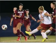  ?? (Photo courtesy SEC/Eric Glemser) ?? Arkansas’ Emilee Hauser takes a shot Thursday during the Razorbacks’ 2-1 victory over South Carolina in the semifinals of the SEC Tournament in Orange Beach, Ala. Hauser scored her first goal of the season in the 53rd minute to give Arkansas a 2-0 lead.