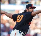  ?? JASON O. WATSON/GETTY IMAGES/TNS ?? Madison Bumgarner of the Giants pitches against the Marlins during the first inning on September 14 in San Francisco.