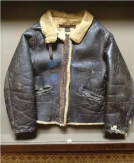  ??  ?? BOTTOM: James “Bud” Wilschke’s original flight jacket was lost for decades after he bailed out of his burning B-17 bomber and hid from the Nazis for six months during World War II. When he finally returned to France and to the farm where he was rescued, the son of the farmer had a surprise waiting for him: his jacket.