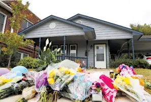  ?? Associated Press ?? ■ A makeshift memorial rests Tuesday on the sidewalk that leads to the home of Atatiana Jefferson in Fort Worth, Texas. Former Fort Worth Police Officer Aaron Dean shot Jefferson through a back window around 2:30 a.m. after a neighbor reported Jefferson’s front door was left open.