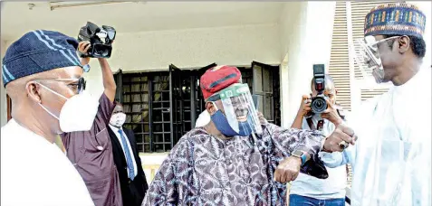  ?? PHOTO: NAJEEM RAHEEM ?? Osun State Governor Adegboyega Oyetola ( left), former Interim National Chairman of the All Progressiv­es Congress ( APC), Adebisi Akande and Acting National Chairman, APC Caretaker Committee and Yobe State Governor, Mai Mala Buni, during a familiaris­ation visit to Akande in Ila- Orangun, Osun State... yesterday.