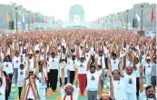  ??  ?? A mass yoga session to mark the fourth Internatio­nal Day of Yoga on June 21 in New Delhi