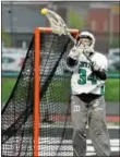  ?? RANDY MEYERS — THE MORNING JOURNAL ?? Westlake goalie Lauren Guay deflects a shot on goal by St. Joseph Academy.