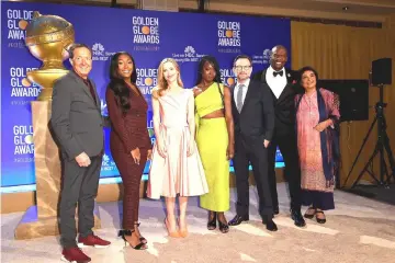  ??  ?? (Left to right) Producer and executive VP of Dick Clark Production­s, Barry Adelman, Golden Globe Ambassador, Isan Elba, Leslie Mann, Danai Gurira, Christian Slater, Terry Crews and HFPA President Meher Tatna attend the 76th Annual Golden Globe Nomination­s Announceme­nt on Thursday in Beverly Hills, California. (Right) Crews speaks onstage at the announceme­nt. — AFP photos