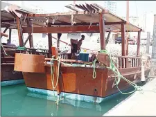  ??  ?? A dhow parked at the beach.