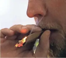  ?? TREVOR HUGHES, USA TODAY ?? A marijuana user smokes cannabis, which is legal in Colorado, during a marijuana pairing dinner in Boulder.