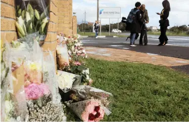  ?? TRACEY ADAMS African News Agency (ANA) ?? FLOWERS are laid outside the Denel premises as a memorial for the victims of the explosion.