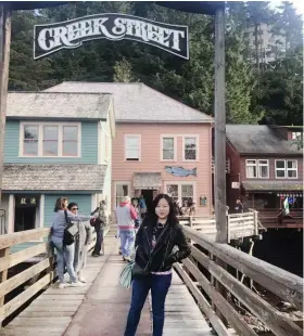  ??  ?? KETCHIKAN. Jane O of Golden JC Travel at Creek Street, the once-upona-time red light district in Ketchikan.