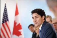  ?? CP PHOTO SEAN KILPATRICK ?? Prime Minister Justin Trudeau takes part in roundtable discussion on the future of energy with industry leaders at CERAweek in Houston, Texas on Thursday.