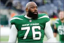  ?? MATT ROURKE — THE ASSOCIATED PRESS FILE ?? Jets offensive lineman George Fant looks on after a game.