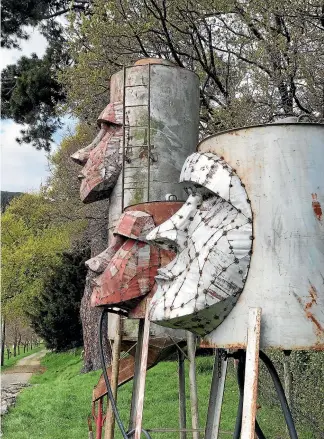  ??  ?? The Watchmen, by Hannah Kidd, created from old water tanks.