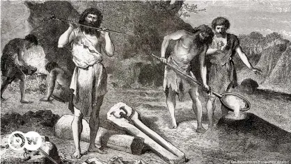  ??  ?? Edad de Bronce: hombres fundiendo metal. De "L'Homme Primitif", publicado en 1870.