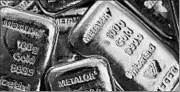  ?? CHRIS RATCLIFFE/BLOOMBERG NEWS ?? The stock markets’ struggles continue to help the price of gold, which rose 1 percent Monday to $1,234.40 an ounce.