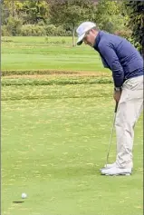  ?? Photos by Pete Dougherty / Times Union ?? Saratoga Spa assistant pro Scott Berliner drives on the par-3 14th hole. Pittsfield (Mass.) head pro Eric Mabee narrowly misses a birdie putt on the 14th hole.