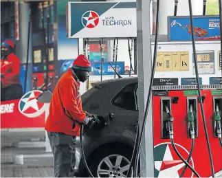  ?? /Alon Skuy/TheTimes ?? No end in sight: The Automobile Associatio­n expects petrol prices to increase by 26c a litre in July and diesel by 24c. Trade war concerns have hit the rand, which also weighs on producer inflation.