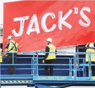  ??  ?? Open: Jack’s banner is hoisted over new shop