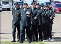  ?? NEWS PHOTO TIM KALINOWSKI ?? Canadian soldiers posted at CFB Suffield march into the parade square for the change of command ceremony on Wednesday.