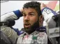  ?? PHELAN M. EBENHACK / AP ?? Bubba Wallace (above) and Denny Hamlin dueled verbally throughout the week.