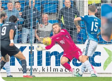  ??  ?? St Johnstone’s Zander Clark saves late on to deny Dundee’s Sofien Moussa