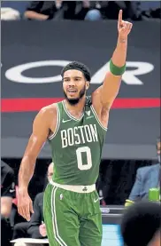  ?? CHRIS O'MEARA / AP ?? Celtics forward Jayson Tatum celebrates a basket against the Raptors in Tampa, Fla., on Monday.