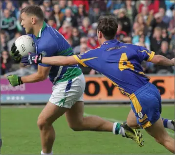  ??  ?? John Leacy of Glynn-Barntown surges past Jack O’Connor (Gusserane) in the first-half of Sunday’s final.