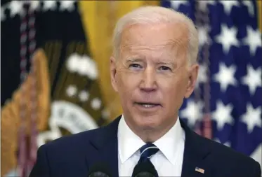  ?? EVAN VUCCI—ASSOCIATED PRESS ?? In this March 25, 2021, file photo President Joe Biden speaks during a news conference in the East Room of the White House in Washington. Biden is taking the opposite approach of the Clinton administra­tion to help the economy. He’s bulking up on debt to fuel growth, offering aid to the poor without work requiremen­ts and pulling back from globalizat­ion.