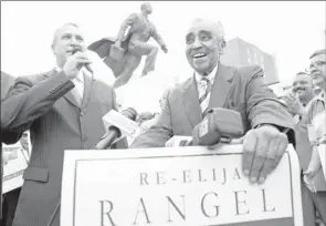  ?? By Brian Harkin for USA TODAY ?? New York support: Rep. Charles Rangel, D-N.Y., right, is endorsed by Adam Clayton Powell in New York City’s Harlem on May 23. Powell ran against Rangel in 2010.