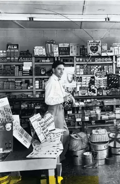  ??  ?? HOOK, LINE, AND SINKER Dick Stack, right, pictured here with his brother, Ed, opened a classic bait-and-tackle shop in Binghamton, New York, in 1948. Things didn’t go according to plan.