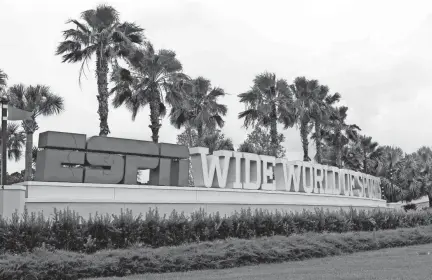  ?? JOHN RAOUX/AP ?? A sign marking the entrance to ESPN'S Wide World of Sports at Walt Disney World is seen June 3 in Kissimmee, Fla.