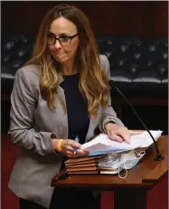  ?? (Arkansas Democrat-Gazette/Thomas Metthe) ?? Sen. Missy Irvin, R-Mountain View, introduces appropriat­ion bills on the state Senate floor Wednesday at the state Capitol. The Senate and the House passed identical versions of the state’s proposed $5.89 billion budget for fiscal 2021, leaving $212.2 million in the budget unfunded. Lawmakers hope to wrap up the fiscal session today.