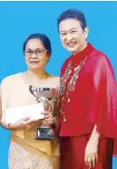  ??  ?? Regional awardee for Visayas Merly Domingo and National Selection Committee (NSC) member Imelda Nicolas.