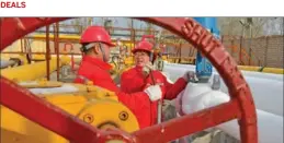  ?? TONG JIANG / FOR CHINA DAILY TONG JIANG / FOR CHINA DAILY ?? EmployeesE­mployees of of China China Petroleum Petroleum & & Chemical Chemical Corp Corp check check natural natural gas gas pipelines pipelines in in Puyang, Puyang, Henan Henan