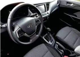  ?? STAFF PHOTO BY MARK KENNEDY ?? The 2019 Hyundai Accent Limited features heated front seats and a leather-wrapped steering wheel.