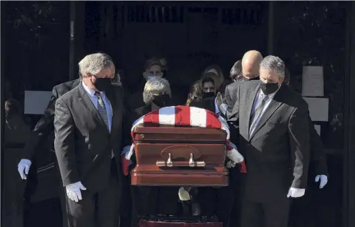  ?? Photos by Will Waldron / Times Union ?? Ken Bruno, right, son of former Senate Majority Leader Joseph Bruno, carries the casket of his late father following funeral services at St. Pius X Church on Friday in Colonie. Bruno died on Tuesday at age 91.