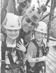  ?? KRISTEN JORDAN SHAMUS, DETROIT FREE PRESS ?? Sarah, Greg and Sam Shamus get ready to ride a zip line in Maui, Hawaii, in February.