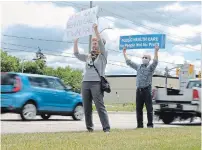  ??  ?? More than 20 people lined King Street East on Wednesday at noon, near MPP Amy Fee’s office, to protest Bill 175, also called the Connecting People to Home and Community Care Act.