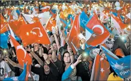  ?? ERDEM SAHIN/EPA ?? Supporters of Turkey’s Recep Tayyip Erdogan celebrate Sunday as elections took place.