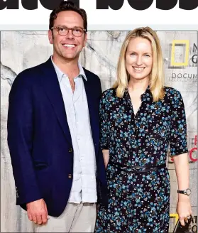  ??  ?? PAYDAY: James Murdoch, with wife Kathryn, is a non-executive director at Tesla