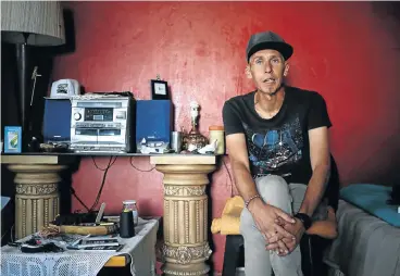  ?? Pictures: Alaister Russell ?? Heroin addict Jacques van Zyl considers his next hit at his father’s home in eMalahleni, Mpumalanga.