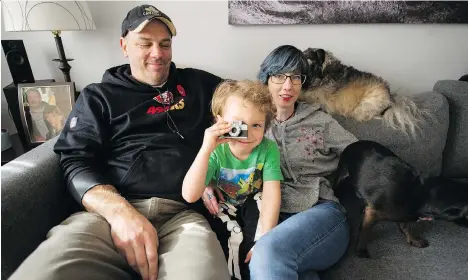  ?? ARLEN REDEKOP ?? Shane and Susanne Destobel said the process can be a challenge, but they are “so glad” to have adopted their son Howie.