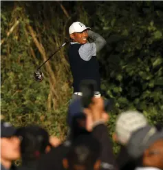  ??  ?? Tiger Woods hits a tee shot on the 12th hole during the third round of the Genesis Open at Riviera Country Club in Pacific Palisades, California. — AFP photo