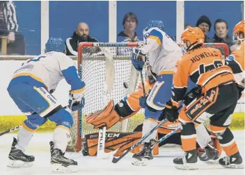  ??  ?? Ice hockey action involving Peterborou­gh Phantoms at Planet Ice in Bretton. Photo: Tom Scott,