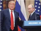  ?? ALEXANDER ZEMLIANICH­ENKO/AP ?? President Trump and Vladimir Putin exchange pleasantri­es in Helsinki.